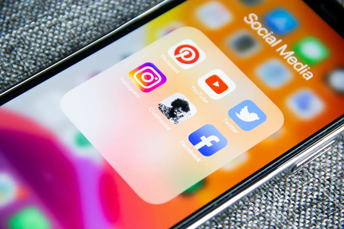 Social media marketing strategy on phone and laptop in Malaysian business setting